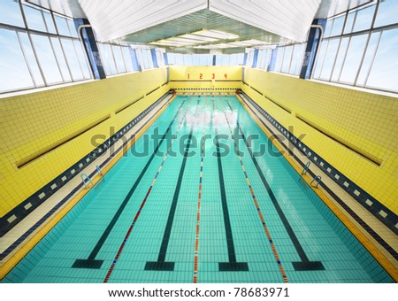 large indoor swimming pool, four bowling lanes, yellow walls, tile