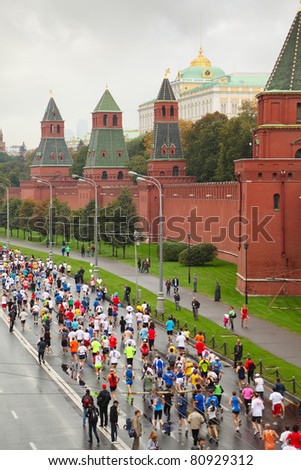 MOSCOW, RUSSIA - SEPTEMBER 12: Top view of running people on Kremlin embankment in XXX Moscow International Peace Marathon on September 12, 2010 in Moscow, Russia. It is annual festival of racing.