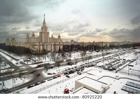 Main building of Moscow State University at winter in Moscow, Russia, view through window