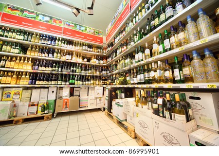 MOSCOW - FEBRUARY 6: Shelves with wine in shop, on February 6, 2011 in Moscow, Russia. In Moscow, trade of alcohol is prohibited from 22:00 to 8:00.