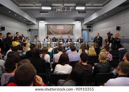 MOSCOW - MAY 6: Popular Dutch DJ Armin Van Buuren (center) and English musician Christian Burns (to his left) speak at a press conference on May 6, 2011 in Moscow, Russia.