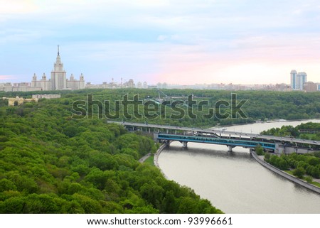 Moscow River, Luzhnetskaya Bridge (Metro Bridge), Moscow State University and panorama of Moscow, Russia at day