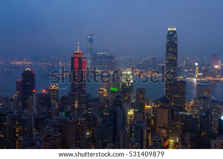 Night view of city in mist and Victoria Harbour in Hong Kong, China, view from Queen Garden