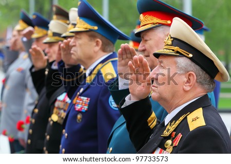 MOSCOW - MAY 8: Veterans salute at ceremony of wreath laying at tomb of Unknown Soldier at Victory Day celebrations, on May 8, 2011, Moscow, Russia.