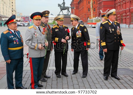 MOSCOW - MAY 8: Unidentified Veterans near monument to military commander Georgy Zhukov on Manege Square at Victory Day, on May 8, 2011, Moscow, Russia.