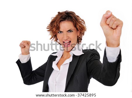 Successful business woman in charge and excited, with her arms up in the air and her fists clenched, ready to take on any obstacle.