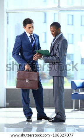 Two businessmen discussing - Isolated studio picture in high resolution.