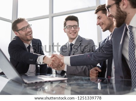 welcome handshake business partners in the office
