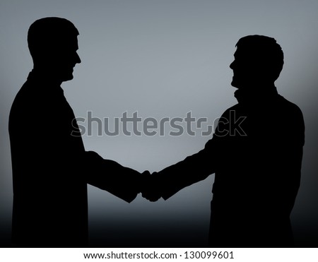Businesspeople figures. Handshake.