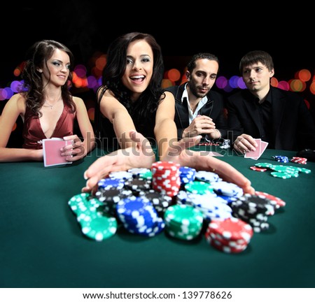 Young Beautiful Woman Playing In Casino