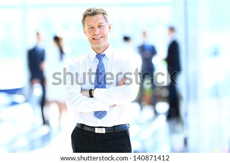 Smiling Businessman In His Office