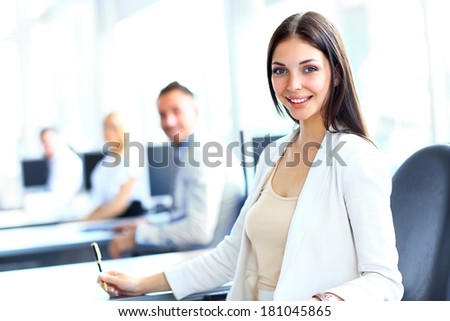 Business woman with her team at the office