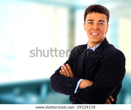 Positive business man smiling over white background