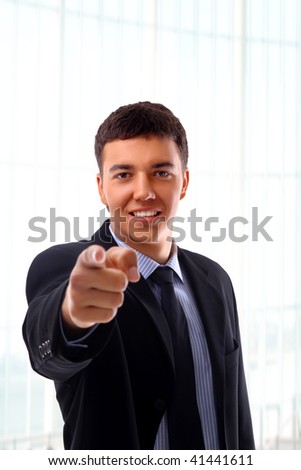 portrait of man pointing at you