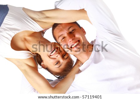 Happy smiling couple in love, over white background