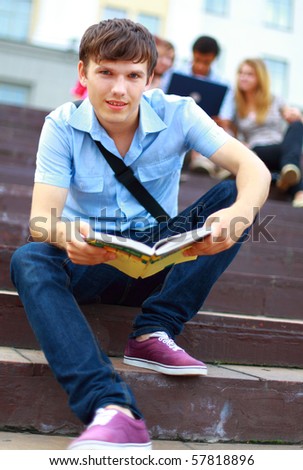 young man read book