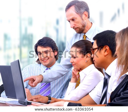 Business meeting - manager discussing work with his colleagues