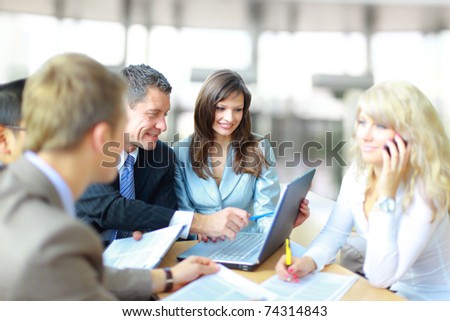 business people at the office as a team