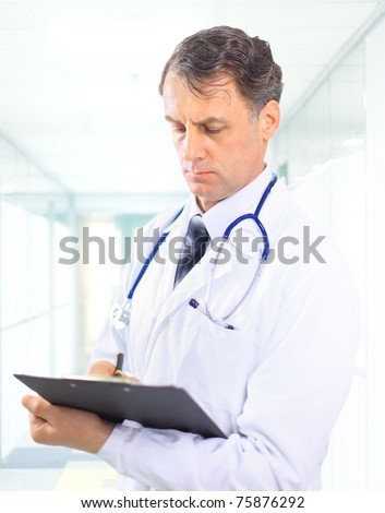 medical doctor with stethoscope. Isolated over white background