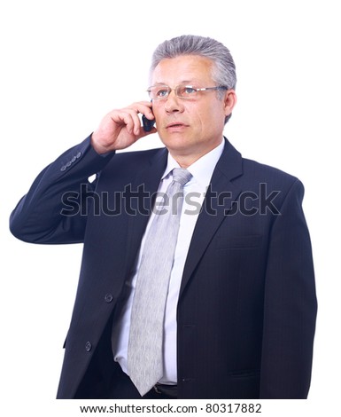 stock photo : Indian mature business man with mobile phone stock photo happy mature executive talking on mobile phone isolated on white background 80317882 stock photo : Indian mature business man with mobile phone