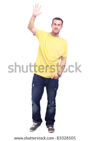 Full length portrait of a stylish young man standing with hands in pockets over white background