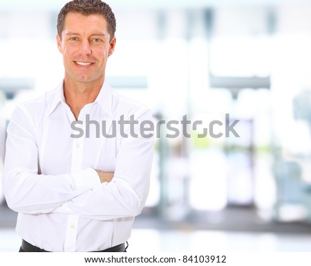 Smiling middle aged business man