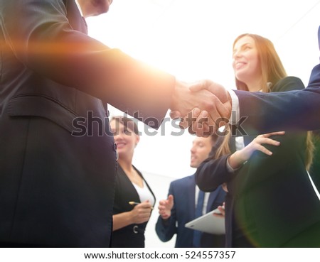 Business handshake. Business handshake and business people conce