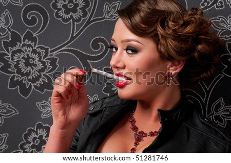 Close up portrait of beautiful elegance glamour woman with cigarette