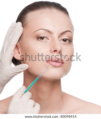 Cosmetic injection in the female face. Lips zone. Isolated