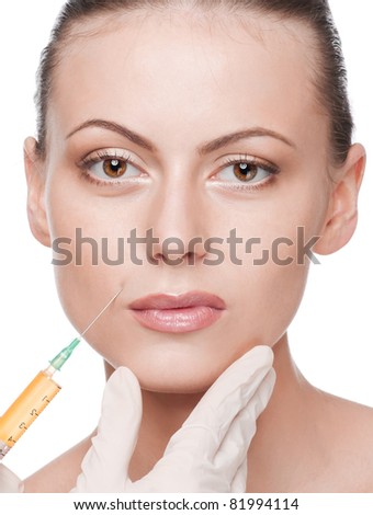 Cosmetic injection in the female face. Lips zone. Isolated