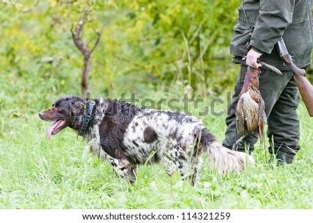 hunter with his dog hunting