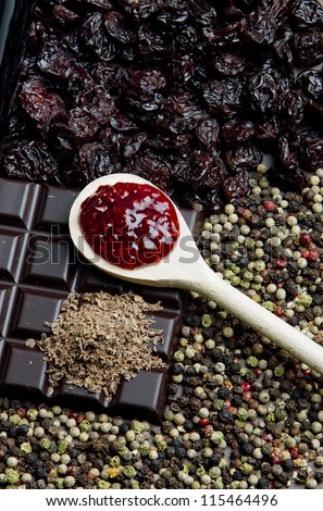 dried fruit with chocolate, jam and pepper