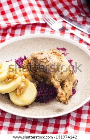 duck meat with potato dumlings and red cabbage