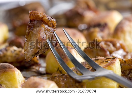 pork roast meat with potatoes