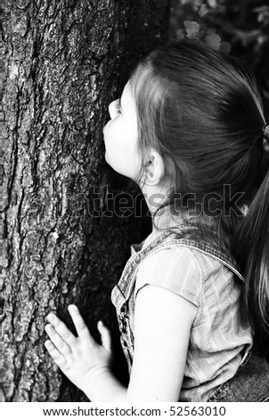 http://image.shutterstock.com/display_pic_with_logo/423193/423193,1273245400,1/stock-photo-little-girl-kissing-a-tree-52563010.jpg