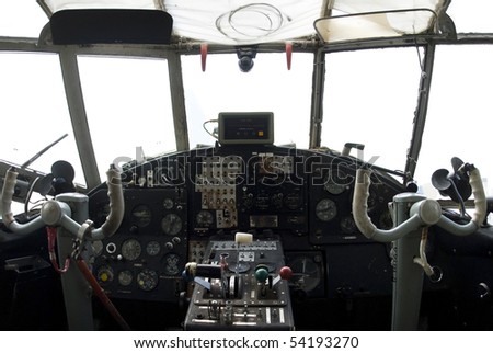 controls and equipment in cockpit of airplane