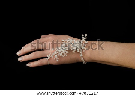 Elegant bracelet on a hand of the girl