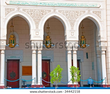 Arches at the entrance to a Dubai Mosque - stock photo