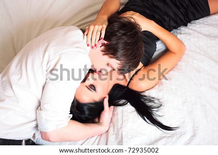 Man and woman on bed