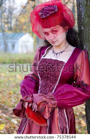 woman at historical dress at park