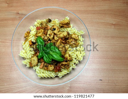 Vegetarian Fake Chicken and Vegetable Pasta in a glass bowl
