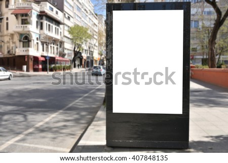 Blank billboard or poster in city center