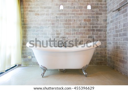 Beautiful luxury vintage bathtub decoration in bathroom interior - Vintage filter