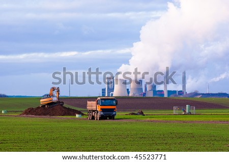 Excavator, truck and power plant
