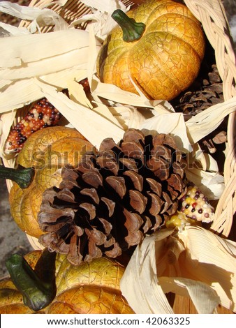 Cornucopia Filled With Pumpkins, Pine Cones and Corn