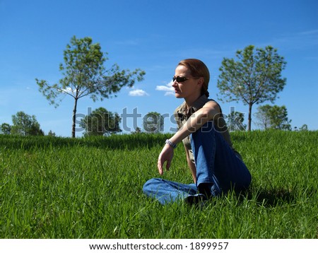 Woman sitting in the sun
