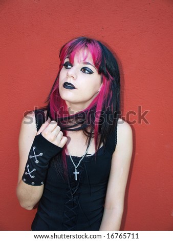 Gothic woman and red wall