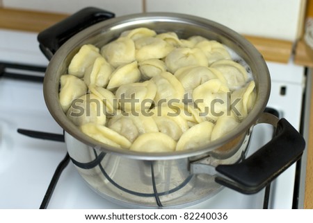 Russian pelmeni meal cooked in a pan