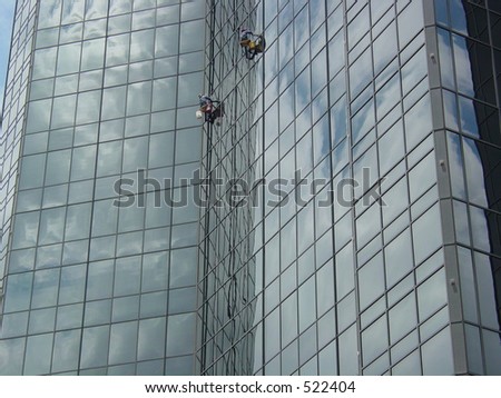 Window washers on a skyscraper (high)