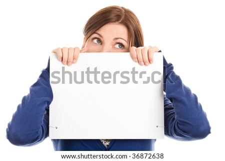 Portrait of beautiful worried woman covering face with blank note card isolated on white background